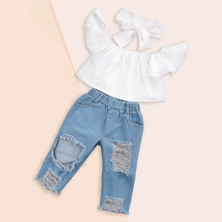 Picture of White Top With Blue Jeans For Girls