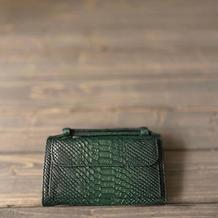 Picture of Dark Green Crocodile Skin Clutch Bag From Lulwa Al Khattaf
