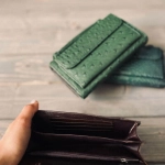 Picture of Dark Green Crocodile Skin Clutch Bag From Lulwa Al Khattaf